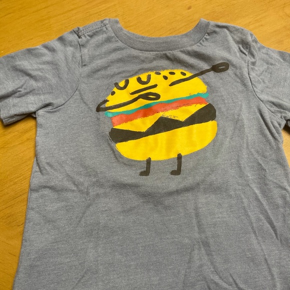 Short sleeve T-shirt with cheeseburger design.